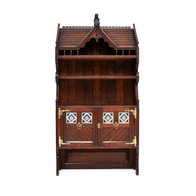 An incredibly beautiful and exceptionally rare antique aesthetic movement cabinet by John Moyr Smith. This was made in...