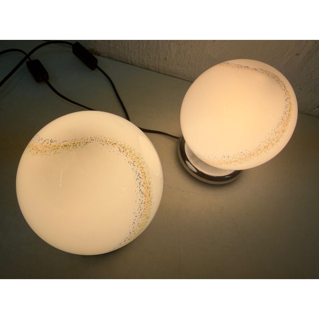 Two small table lamps from the 1970s, single-bulb, E14 socket. Chrome-plated metal and glass. Good used condition. 19 x 14...