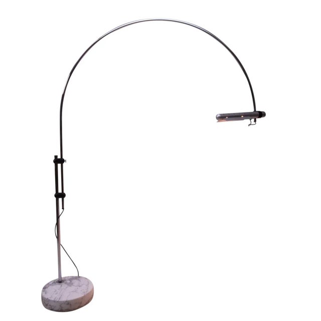 The Halo-Mobil Floor Lamp by Rico and Rosemarie Baltensweiler was designed in the 1970s. Our version comes with a marble...