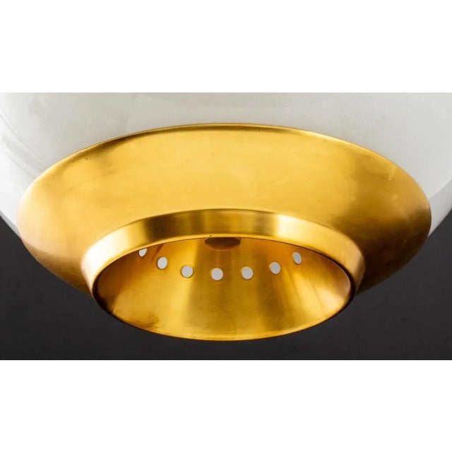 Mid Century Modern Gilt Metal and Frosted Glass Ceiling Light with label "Model# 1000 - T. Hayes".