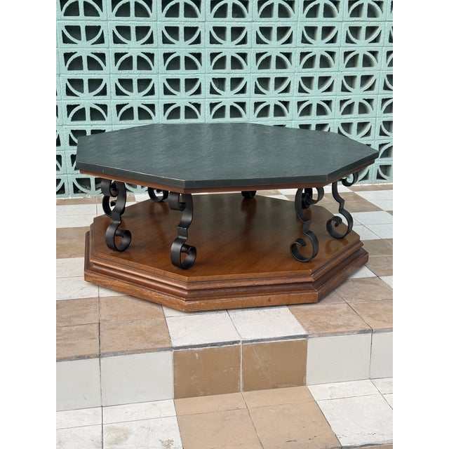 Awesome C. 1969 mid-century modern Spanish Revival style octagonal slate top coffee table with scrolled black iron...