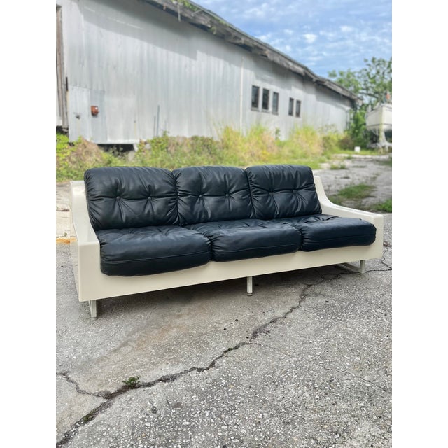 Vintage Homecrest style fiberglass sofa set with black tufted cushions. Such charm and character with this set. Fiberglass...