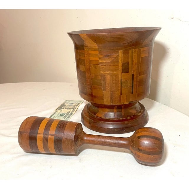 Up for sale is a very large rare antique hand turned wooden mortar and pestle. It carved and turned by hand out of a very...