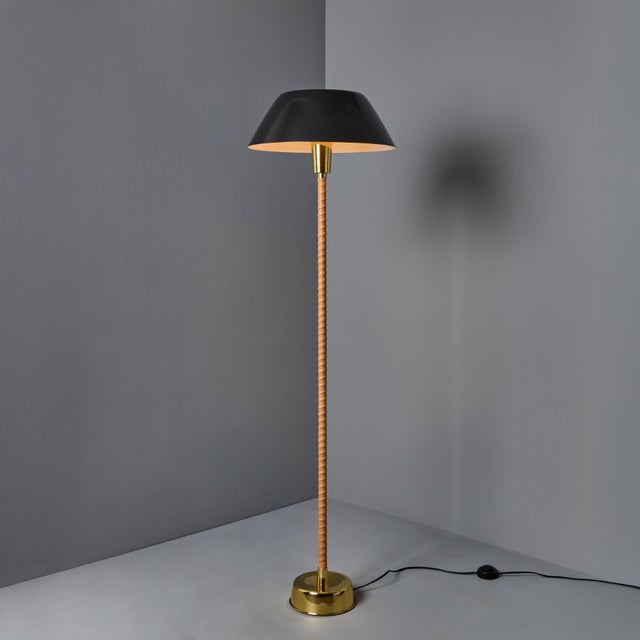 Lisa Johansson-Pape 'Senator' floor lamp for Innolux Oy. An iconic lamp design by the Finnish master executed in brass,...