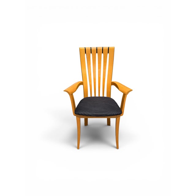Elevate your dining space with this exceptional set of Italian-inspired lacquer dining chairs, distinguished by their...