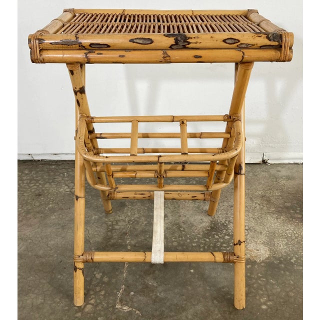 Vintage collapsible bamboo tray top service table featuring removable tray top and collapsible base with three holsters...