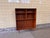 This Danish bookcase is crafted in warm teak and features a clean and beautifully balanced design. The large open space at...