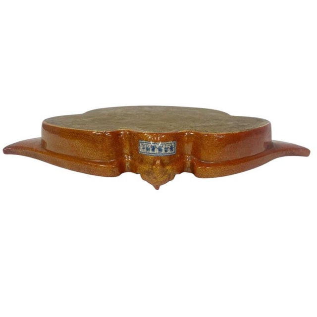 This striking Japanese Satsuma shell-shaped bowl is a beautifully decorative example of Meiji period ceramic artistry,...