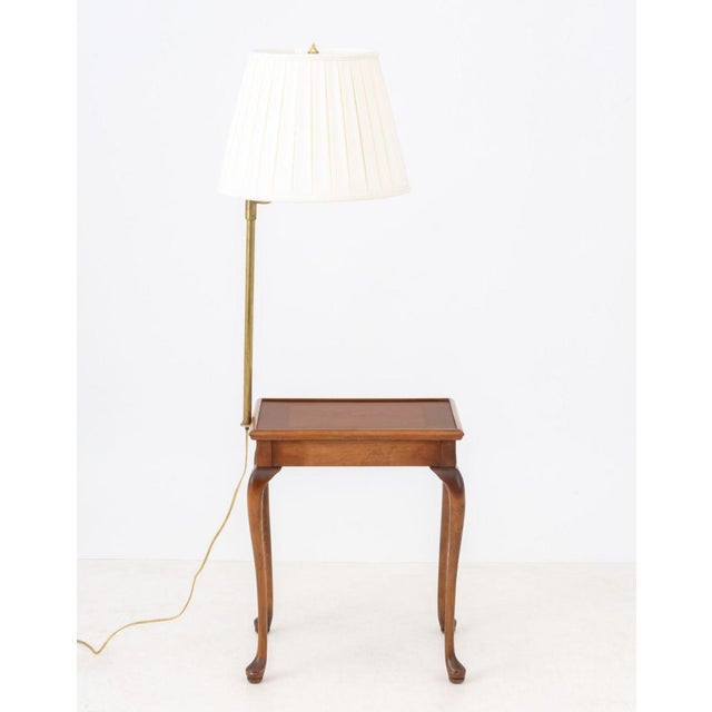 Queen Anne Style Burlwood Side Table with Brass Swing Arm Lamp, the lamp with white pleated shade, the table on four...