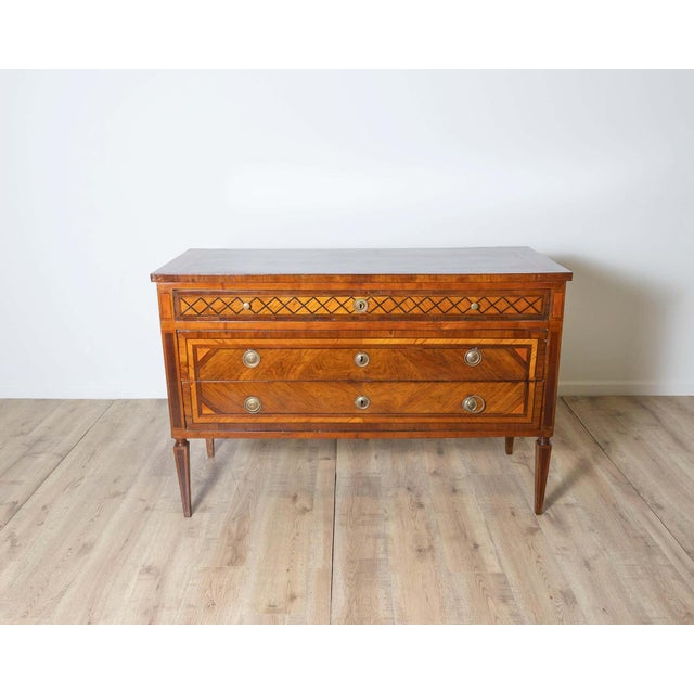 A rare and refined Louis XVI period dresser from the Bolognese area, dating from the late 18th century. Crafted with...