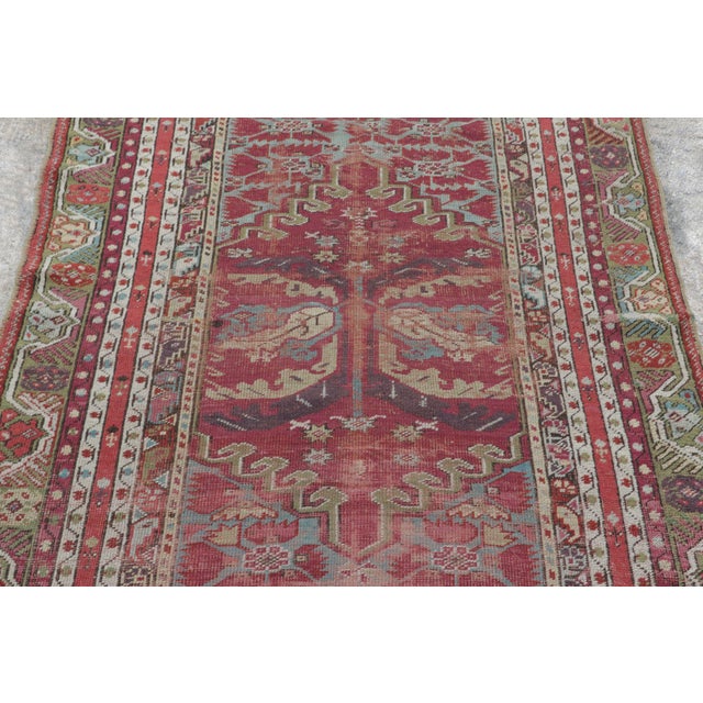 Hand-knotted in wool, this 4x6 antique Anatolian Kırşehir prayer rug from Turkey dates to circa 1840–1860. A notable...