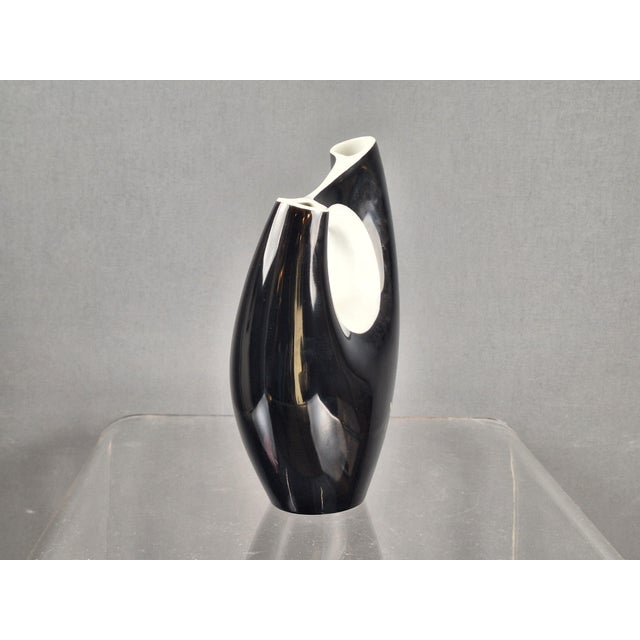 Organically shaped vase by Beate Kuhn for Rosenthal Studio Line, 1950s, glazed in black and white This piece has an...