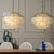 Aloadecor 7-Light 24'' Mid-Century Modern Coastal Aged Bronze 4-Tier Natural Capiz Shell Chandelier Vintage Glam Pendant Light For Sale In Houston - Image 6 of 7