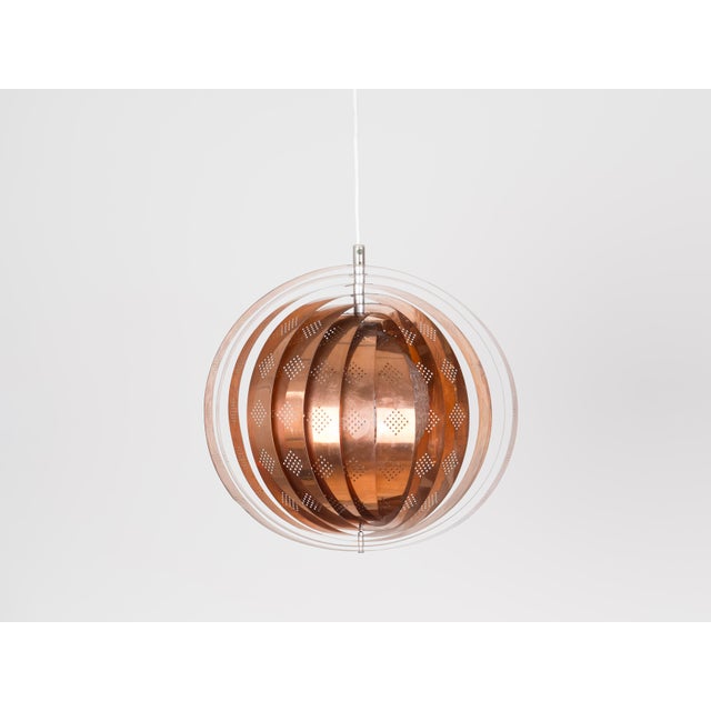Vintage Moon pendant lamp with a distinctive sculptural design. The lamp consists of concentric, movable crescent-shaped...