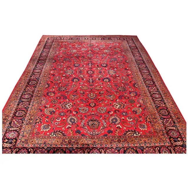 ACTUAL SIZE: 10’0″ x 16’5″ PRIMARY COLOR: Red / Navy AGE: Old MATERIALS: Wool FOUNDATION: Cotton PRODUCTION: Handwoven,...