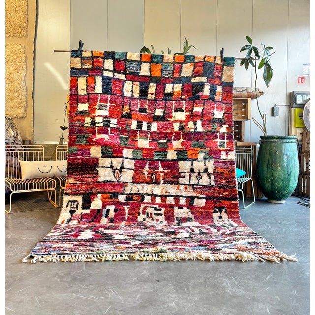 This Moroccan Boujad rug is a handwoven piece from the Boujad region in the Middle Atlas Mountains of Morocco. Boujad rugs...