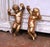 Decorate a living room, entryway, or chapel corner with this expressive pair of antique Italian wall-hanging cherub...