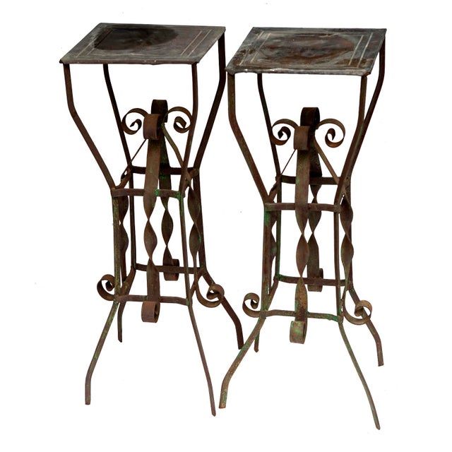 A Charming Pair of Vintage Wrought Iron Garden Pedestals with beautiful green/rust patina. Top them off with a pair of...