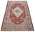 Hand-knotted with care using traditional rug-making techniques, this wool rug blends timeless craftsmanship with a modern...