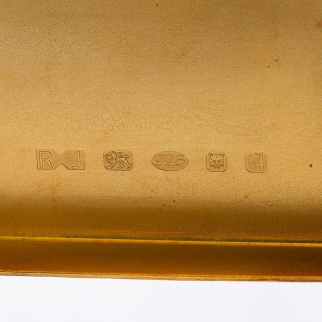 Modern 21st century solid silver book shaped cigar box. Elegantly crafted, this box has a solid silver body shaped like a...