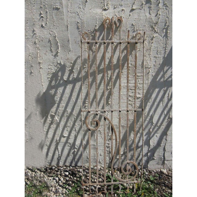 This antique Victorian iron gate is a wonderful piece of architecture. Heavy, tight and sturdy. Piece does show signs of...