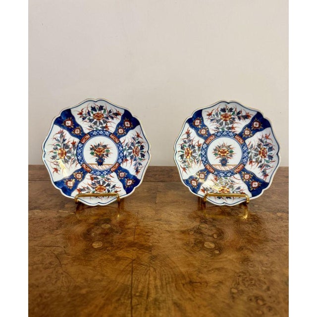 Fine quality pair of antique Japanese imari plates, having a quality pair of Japanese imari plates decorated with a basket...