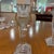 Elegant pair of vintage Orrefors crystal candlesticks from Sweden. Each features a tall, squared stem with delicate etched...