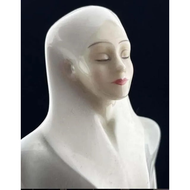Royal Doulton figurine titled "Sophistication" by Adrian Hughes (HN3059), a stunning addition to any collection. The piece...