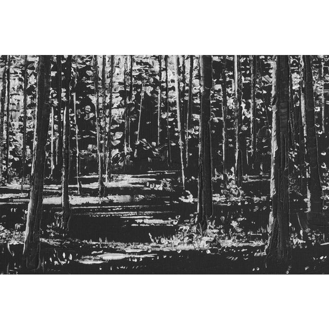 This oil on board painting captures a dense forest scene rendered in striking black and white, evoking a sense of solitude...