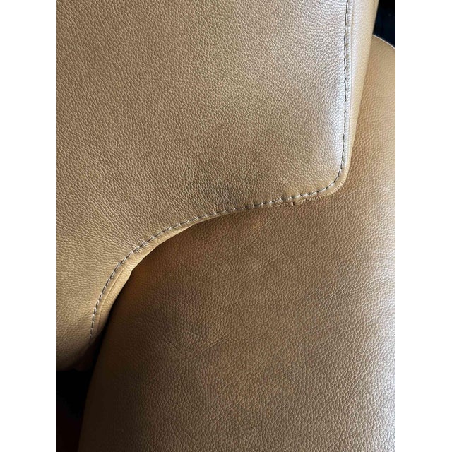 Pair of French leather armchairs by Burov of Paris. BUROV (Groupe Burov Leleu), an iconic French design house and...