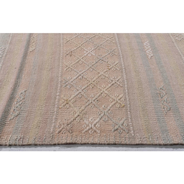 This vintage Turkish flat weave Kilim is hand-woven. The simplicity and boldness of this piece can also give a...