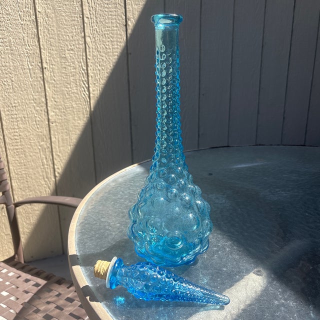 Mid Century Modern Blue Bubble Empoli Genie Bottle that dates to the 1960’s. The bubbles start out large at the bottom and...
