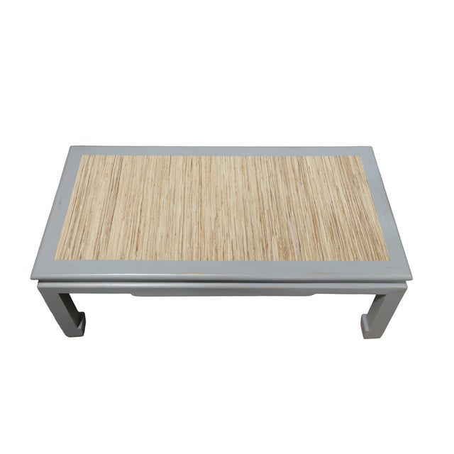 This vintage Ming-style coffee table will add a touch of sophistication to your interior space. It cleverly blends classic...