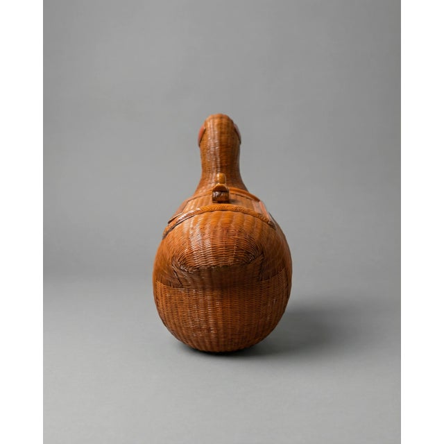 A true conversation piece, this vintage woven duck is equal parts charming and functional. Handcrafted with beautifully...
