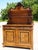 Two-door/two-drawer walnut sideboard topped with shelves. Dovetailed drawers with wooden pendant handles. Two hinged doors...