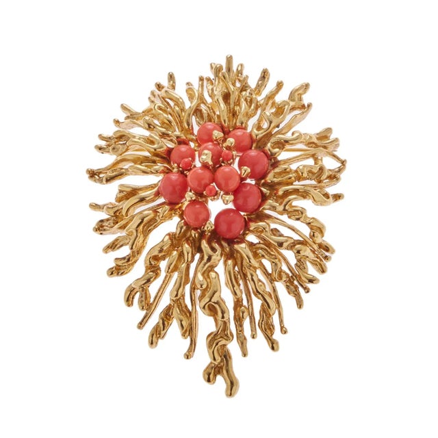 Gold plated coral brooch with orange stones Measurements: 3 1/4" x 2 1/2"