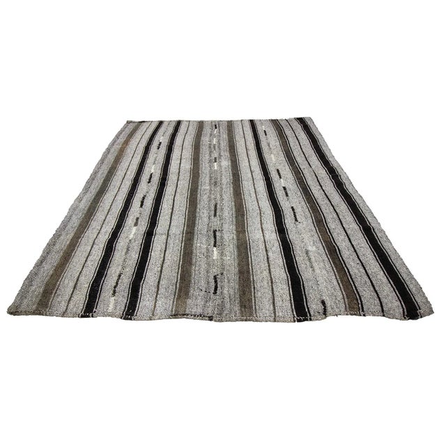 Striped Vintage modern kilim rug from Adana region of Turkey. Approximately 45-55 years old. In very good condition