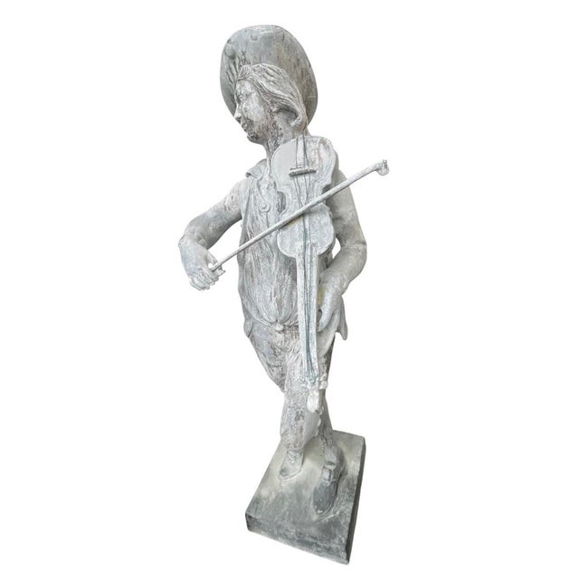 Embrace timeless European garden charm with this striking full-figure vintage lead statue depicting a classical itinerant...