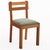 A striking set of six French solid oak dining chairs, attributed to Charles Dudouyt, circa 1945. Designed with a robust,...