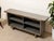 Vintage Industrial Metal Open Shelf Console Cabinet is in heavily distressed vintage condition with extensive age- and...