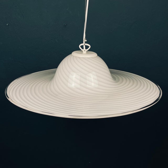 This swirl retro Murano pendant lamp Vetri Murano was made in Italy in the 70s. Very beautiful white Murano glass with...