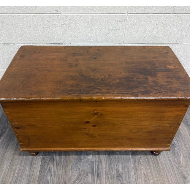 This is a gorgeous antique American primitive blanket chest crafted in solid pine with hand-cut dovetail construction,...