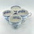 Charming lot of four vintage English teacups referencing the iconic Blue Onion pattern. The listing contains three “Blue...