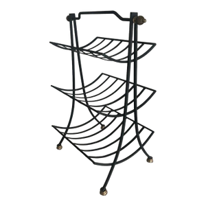 Late 20th Century Black Iron Magazine or Firewood Stand With Gold Accents