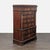 This classic wood dresser features a rich, dark finish and elegant detailing. It offers seven spacious drawers with...