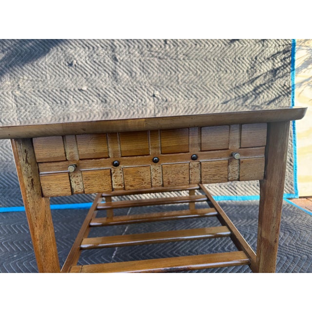 This charming **mid-century modern side table** (or end table) by **Mersman** exemplifies the warm, organic aesthetic of...