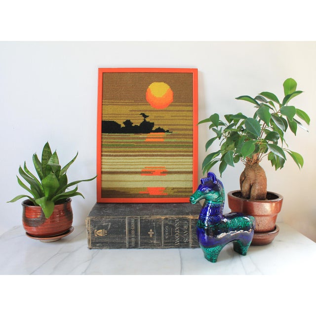 Vintage "Pacific Sunset" needlepoint wall hanging. No makers mark. No glass. Ready to hang. Some light age wear to painted...
