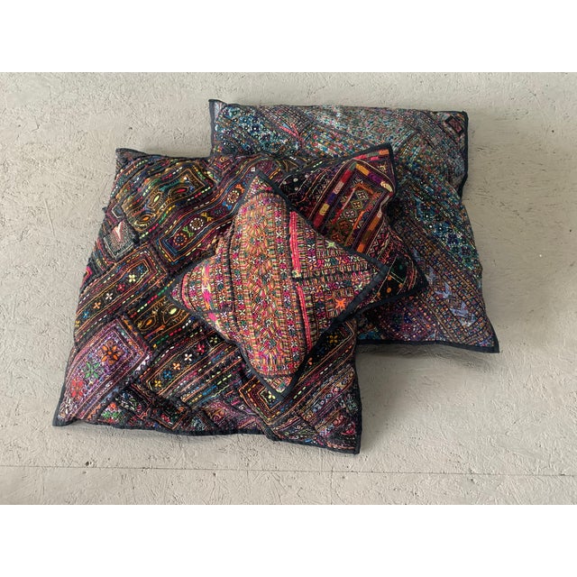 A highly detailed, colorful set of 4 matching decorative cushion covers. These pieces feature authentic Pakistani folk-art...