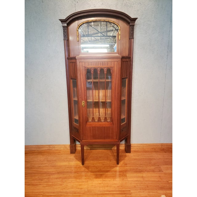 Antique Walnut Victorian Curio Cabinet w Mirror What a remarkable selection we have here, this Victorian Curio Cabinet is...