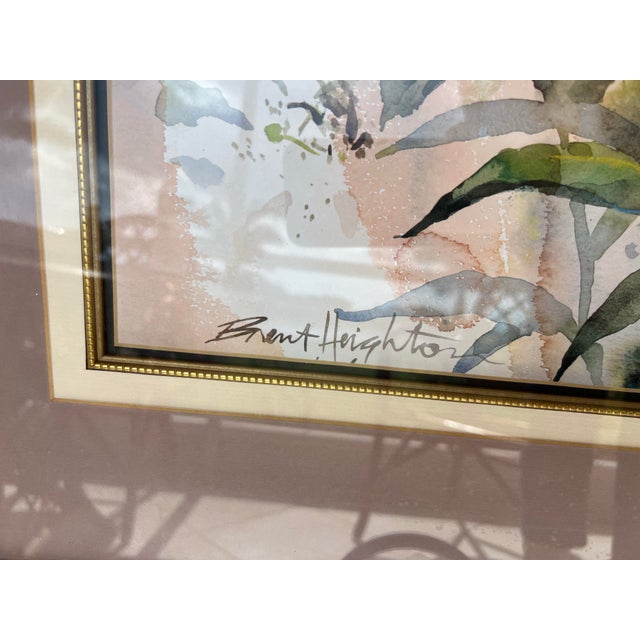 Beautiful floral watercolor painting signed by Brent Heighton, a recognized artist known for his vibrant watercolors and...